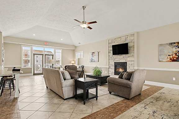 Community Building with Fireplace Wall at Andover Pointe Apartment Homes in La Vista, NE