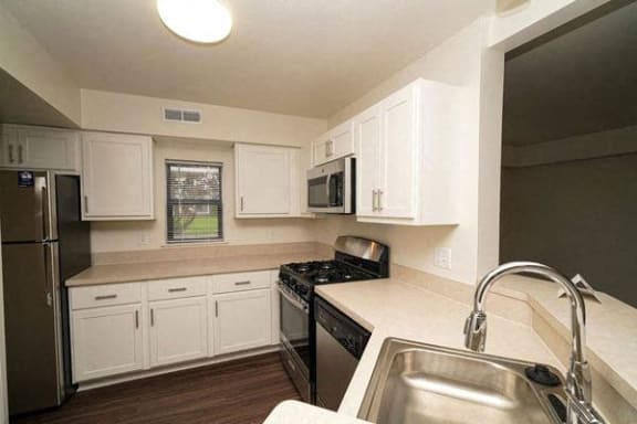 a kitchen with stainless steel appliances at Arbor Lakes Apartments in Elkhart, IN