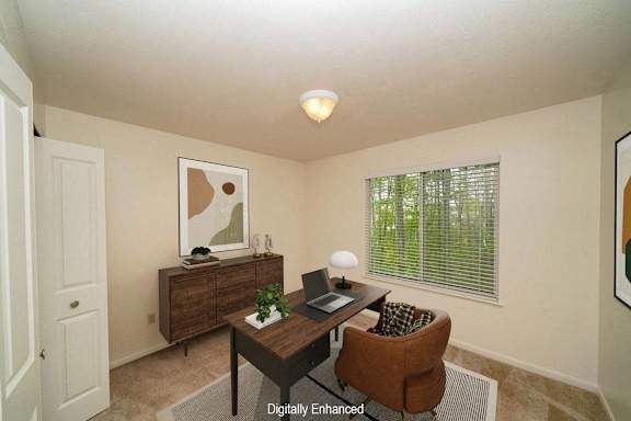 A bedroom set up as an office with a desk and chair A bedroom set up as an office with a desk and chair at Autumn Lakes Apartments and Townhomes, Indiana, 46544