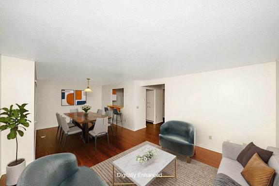 A living room and dining room with hard surface flooring A living room and dining room with hard surface flooring at Autumn Lakes Apartments and Townhomes, Indiana