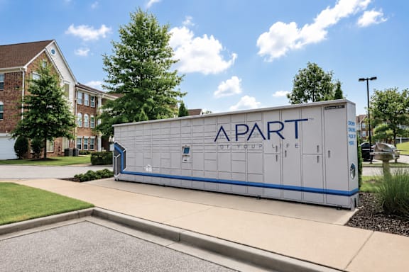 A white and blue trailer with the words Apartment Life on it.