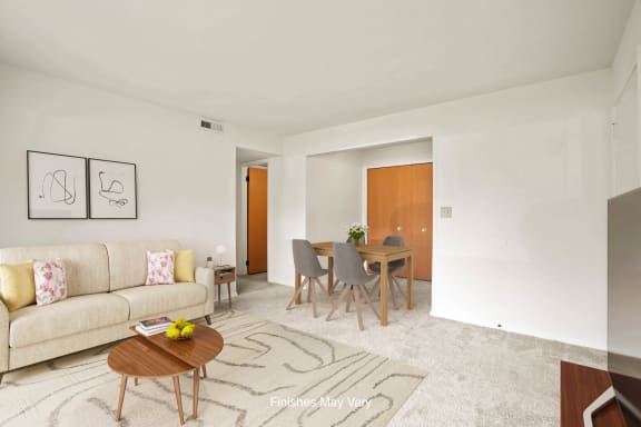 a living room and dining room in a two bedroom apartment at Beacon Hill and Great Oaks Apartments, Rockford, IL, 61109