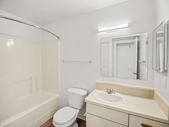Full bathroom with vanity and shower tub enclosure at Black Sand Apartments Homes, Lincoln, 68504