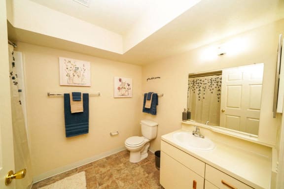 spacious bathroom with large mirror at Black Sand Apartment Homes, Lincoln, 68504