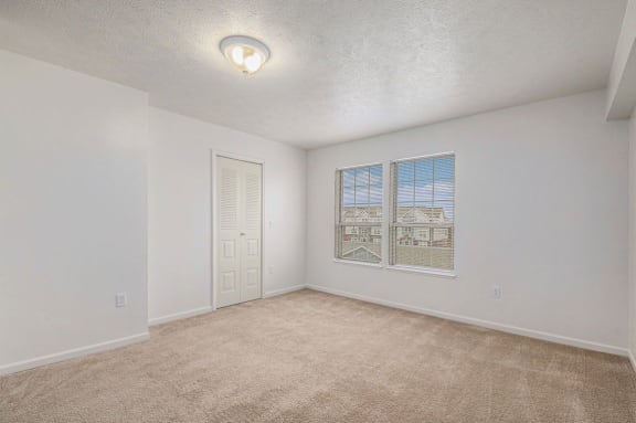 spacious bedroom with large windows  at Black Sand Apartment Homes, Nebraska