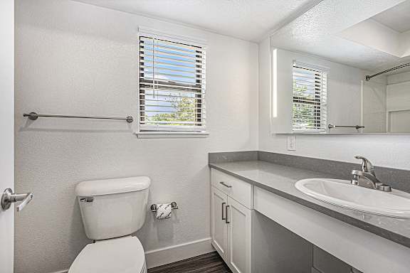 A bathroom with a window A bathroom with a window at Byron Lakes Apartments, Michigan, 49315