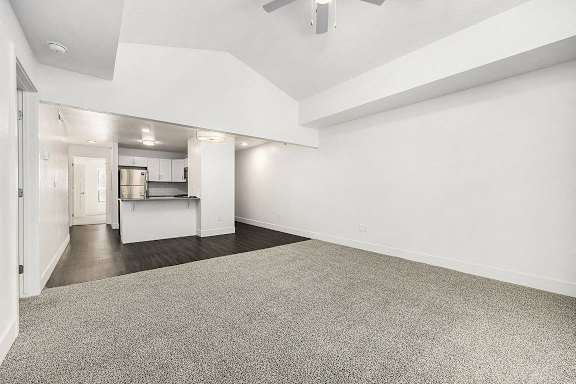 two bedroom living room with cathedral ceiling  at Byron Lakes Apartments, Michigan