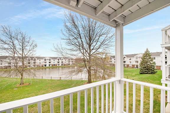 A private balcony with a view at The Crossings Apartments, Grand Rapids, MI, 49508