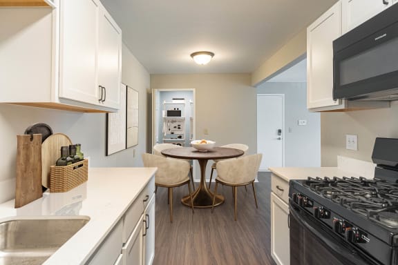 Dahlia Renovated Kitchen and Dining Room at Bristol Square & Golden Gate Apartments in Wixom, MI