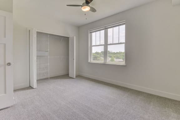 Walk-In Closet with Organizers at Dodson Pointe Apartment Homes in Rogers, AR