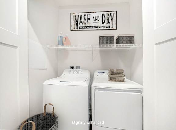 A full size washer and dryer at Dodson Pointe Apartment Homes, Rogers