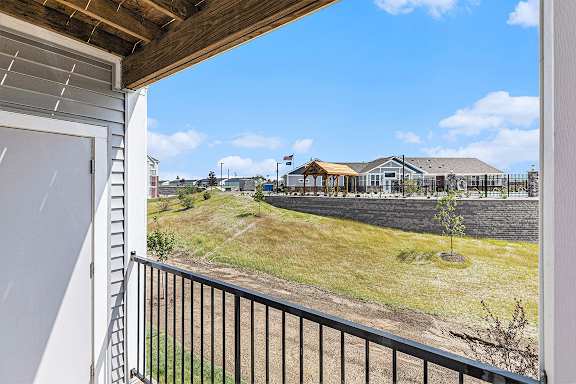 A patio/balcony with a view at Eagle Ridge Apartment Homes, Traverse City, MI 49685