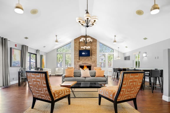 Spacious Clubhouse with Fireplace and TV Seating at Pheasant Run in Lafayette, IN 47909