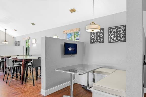 A kitchen with a table and chairs at Bay Pointe Apartments, Lafayette, IN, 47909