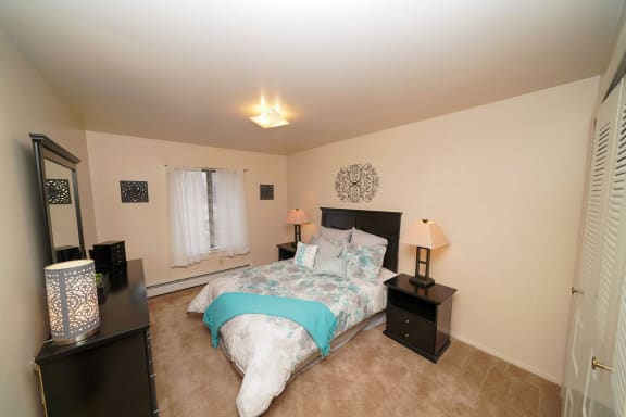 Bedroom at Fairlane Apartments in Springfield, MI 49037