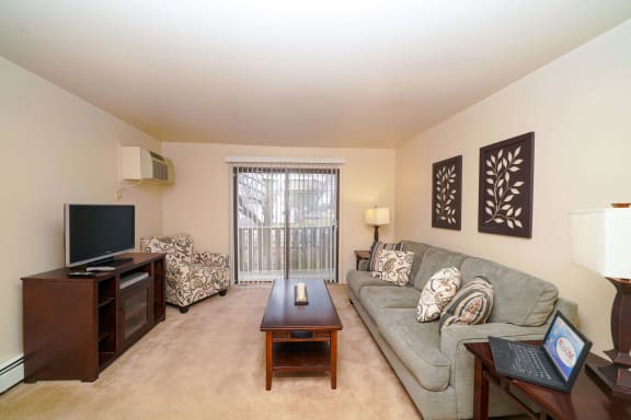Living Room at Fairlane Apartments in Springfield, MI 49037