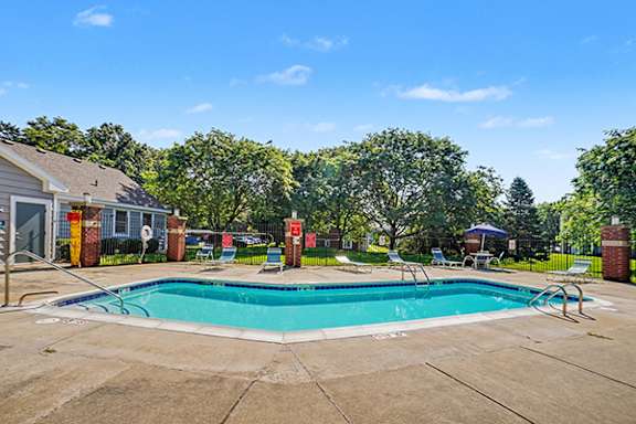 Refreshing pool and large sundeck with free Wi Fi at Foxwood and The Hermitage, Portage, Michigan