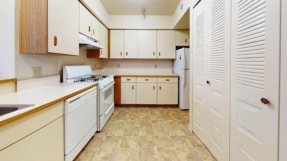a kitchen with white appliances at Gull Prairie/Gull Run Apartments and Townhomes, Michigan, 49048