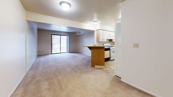 an entry to a dining and living room at Glenn Valley Apartments, Battle Creek
