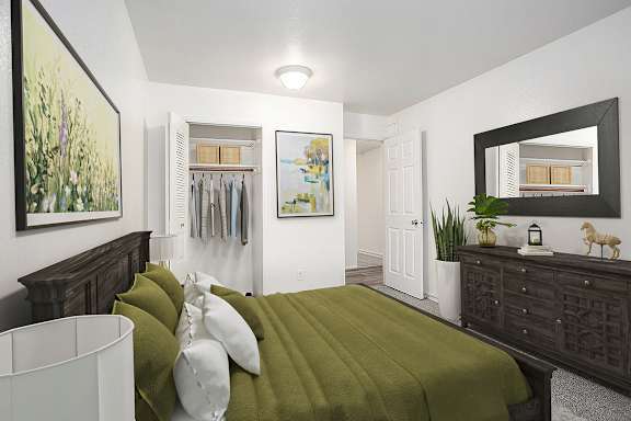 A bedroom with a large closet at Hampton Lakes Apartments, Michigan, 49534