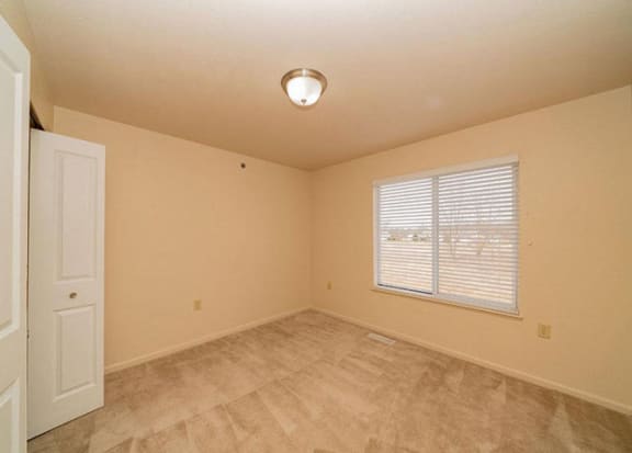 bedroom with large window bedroom with large window at Foxwood and The Hermitage, Portage