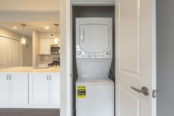 a washer and dryer in a kitchen at Hillside Apartments, Michigan