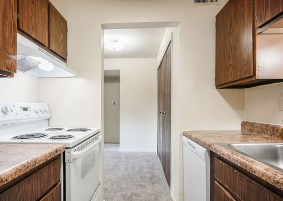 hardwoood cabinetry kitchen leading into the breakfast nook at Bavarian Village Apartments, Indiana