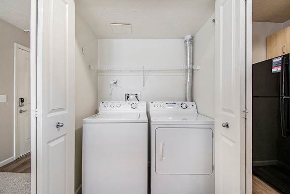 A full-size washer and dryer at Lynbrook Apartments and Townhomes, Elkhorn, NE, 68022