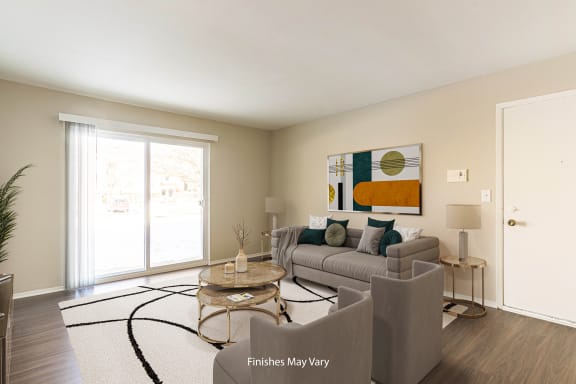 Magnolia Living Room at Bristol Square & Golden Gate Apartments in Wixom, MI