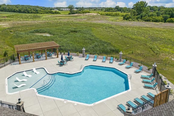Refreshing Pool with Pergola at Meadowbrooke Apartment Homes, Grand Rapids