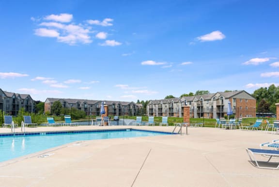 Pool With Large Sundeck and Wi-Fi at Oak Shores Apartments in Oak Creek, WI
