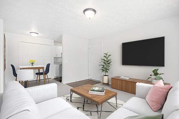 A modern living room leading to a dining room with a closet at Old Farm Apartments, Elkhart, 46517