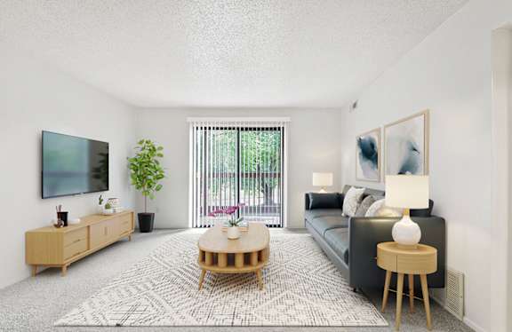 living room with a sliding glass door to a balcony at Old Monterey Apartments, Missouri, 65807