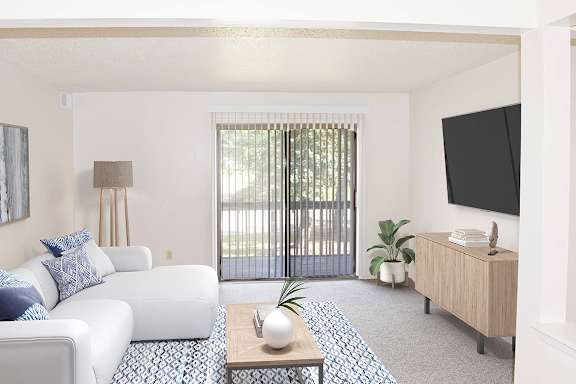 a living room leading to private balcony at Seville Apartments, Michigan, 49009