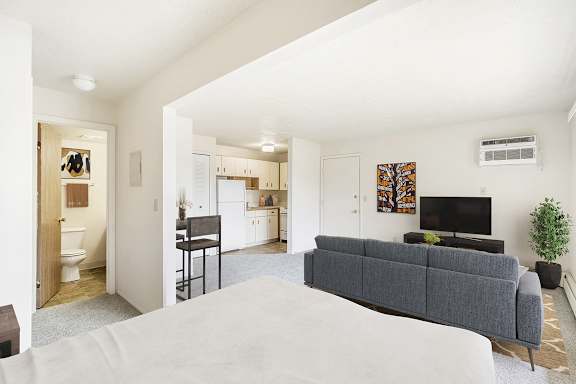 studio living areas with furniture at Seville Apartments in Kalamazoo, MI 49009