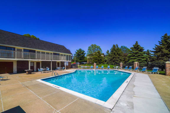 Pool With Large Sundeck at Seville Apartments in Kalamazoo, MI