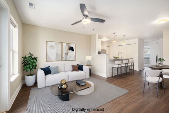 a living room with hard surface flooring at Stoney Pointe Apartment Homes in Wichita, KS