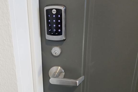 Smart lock on a door at Tanglewood Apartments, Oak Creek, 53154