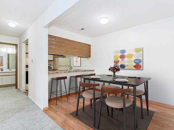 A dining room and a kitchen  at Tanglewood Apartments, Oak Creek, WI