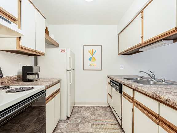 a kitchen with a dishwasher at Tanglewood Apartments, Oak Creek, WI