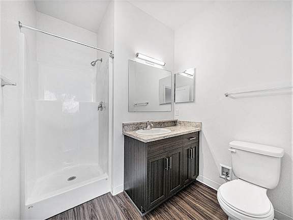 A bathroom with a shower at Trade Winds Apartment Homes, Elkhorn, NE