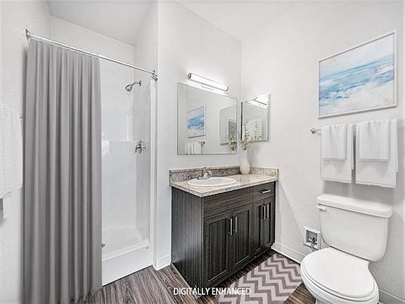 second bathroom with a walk in shower at Trade Winds Apartment Homes, Elkhorn, Nebraska