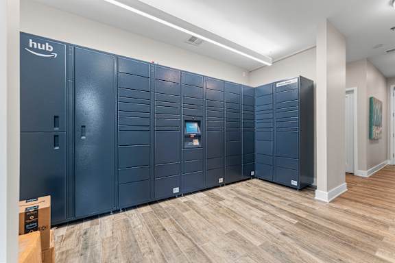 A row of dark blue storage units with the word