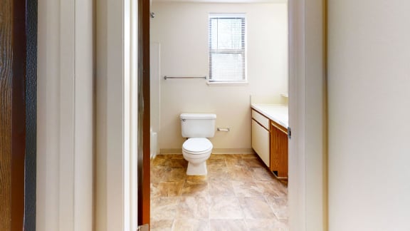 end style bathroom with a window at Windmill Lakes Apartments, Holland, 49424