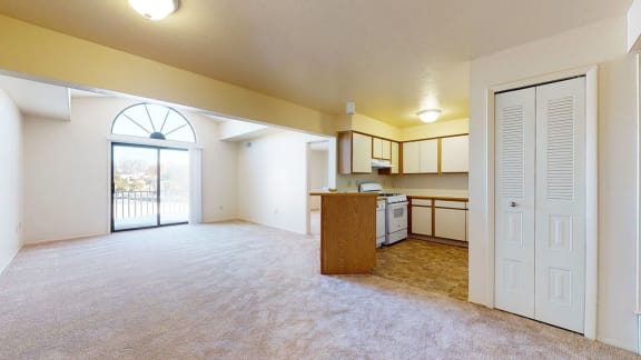 Two bedroom one bath living room with cathedral ceiling at Windmill Lakes Apartments, Holland, 49424