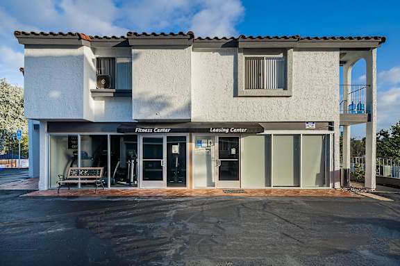 A building with a leasing center and fitness center.