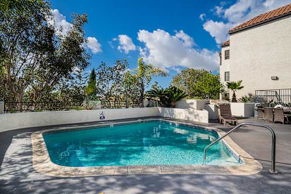 the swimming pool at the villa apartments