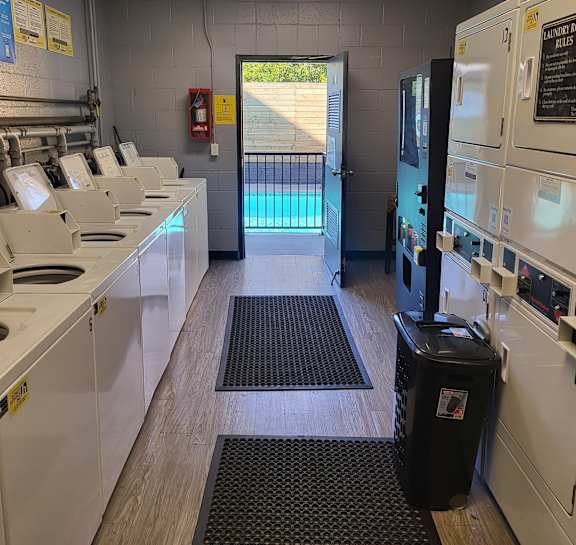 a kitchen with a pool and a door in the back