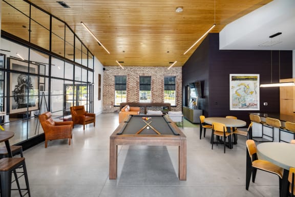 Billiards room with dry bar, lounge and flat-screen TVs