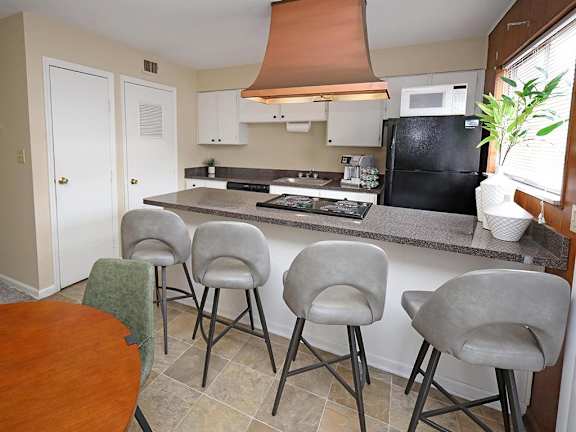 Model Kitchen and Dining Area at Colonial Park Townhomes in Euclid OH